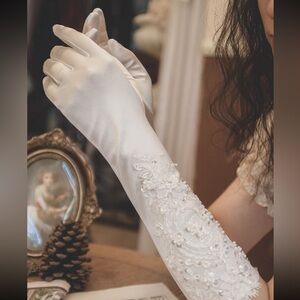 New white stretch satin beaded mid elbow length gloves